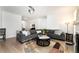 Living Room with sectional sofa, hardwood floors and fireplace at 2024 Gramercy Cir, Atlanta, GA 30341