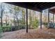 Wooded backyard view from under the deck at 372 Provenance Dr, Sandy Springs, GA 30328