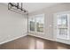 Bright dining area with hardwood floors and access to rear deck at 372 Provenance Dr, Sandy Springs, GA 30328