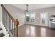 Spacious dining area with hardwood floors and access to rear deck at 372 Provenance Dr, Sandy Springs, GA 30328