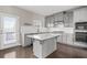 Modern kitchen with gray cabinets, white countertops, and island at 372 Provenance Dr, Sandy Springs, GA 30328