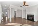 Bright living room features hardwood floors, fireplace, and open floorplan at 372 Provenance Dr, Sandy Springs, GA 30328