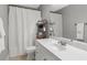 Clean bathroom with white vanity, shower, and updated fixtures at 45 Highland Park Way, Sharpsburg, GA 30277