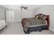 Large bedroom with king-size bed and ample closet space at 45 Highland Park Way, Sharpsburg, GA 30277