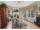 Bright breakfast nook with built-in shelving and fireplace at 45 Highland Park Way, Sharpsburg, GA 30277