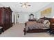 Main bedroom features a large bed and ample closet space at 45 Highland Park Way, Sharpsburg, GA 30277