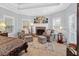 Bedroom sitting area with fireplace and comfortable seating at 45 Highland Park Way, Sharpsburg, GA 30277