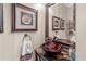 Elegant powder room with granite vanity and a modern vessel sink at 45 Highland Park Way, Sharpsburg, GA 30277