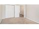 Bedroom with double doors leading to a closet and hallway at 80 Valley Dr, Stockbridge, GA 30281