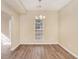 Simple dining room with hardwood floors and a chandelier at 80 Valley Dr, Stockbridge, GA 30281