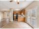 Kitchen with light wood cabinets, black appliances, and a breakfast bar at 80 Valley Dr, Stockbridge, GA 30281