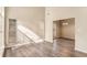 Bright living room with hardwood floors and views into dining area at 80 Valley Dr, Stockbridge, GA 30281