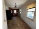 Kitchen with black appliances and brown tile floor at 2369 Christian Cir, Covington, GA 30016