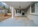 Covered back porch with single door entrance at 2802 Mcafee Rd, Decatur, GA 30032