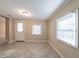 Bright sun room with tiled floors, a window and a glass paneled door at 2802 Mcafee Rd, Decatur, GA 30032