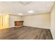 Basement featuring laminate flooring and a wet bar with a small sink at 4741 W Lake Se Dr, Conyers, GA 30094
