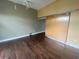 Bright bedroom featuring hardwood floors and barn door at 502 Pryor Sw St # 322, Atlanta, GA 30312