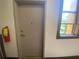 Apartment entry door with fire extinguisher at 502 Pryor Sw St # 322, Atlanta, GA 30312