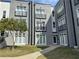 Building exterior showcasing multiple units and landscaping at 502 Pryor Sw St # 322, Atlanta, GA 30312