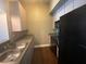 Open kitchen with stainless steel appliances and wood floors at 502 Pryor Sw St # 322, Atlanta, GA 30312