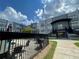 Community pool area with patio furniture and grill at 502 Pryor Sw St # 322, Atlanta, GA 30312
