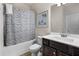 Bathroom with tub shower combination and updated vanity at 53 Cottontail Ln, Loganville, GA 30052