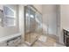 Spa-like bathroom with a large walk-in shower and glass enclosure at 53 Cottontail Ln, Loganville, GA 30052