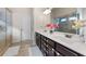 Double vanity bathroom with a large walk-in shower at 53 Cottontail Ln, Loganville, GA 30052