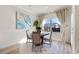 Charming breakfast nook with a round table, four chairs, and plenty of natural light at 53 Cottontail Ln, Loganville, GA 30052