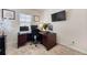 Bright home office features a large desk, ample workspace, and plenty of natural light at 53 Cottontail Ln, Loganville, GA 30052
