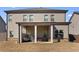 Two-story house with covered patio, and spacious backyard at 53 Cottontail Ln, Loganville, GA 30052