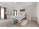 Spacious main bedroom with a plush bed and ample natural light at 53 Cottontail Ln, Loganville, GA 30052