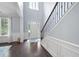 Bright two story entryway with hardwood floors and a staircase leading upstairs at 5540 Fords Crossing Nw Ct, Acworth, GA 30101