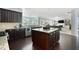 Kitchen with large island, granite, and stainless steel appliances at 5540 Fords Crossing Nw Ct, Acworth, GA 30101