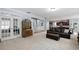Open living room with view into kitchen and dining area at 5540 Fords Crossing Nw Ct, Acworth, GA 30101