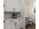 Chic bathroom with gray tile shower, double vanity, and modern fixtures at 1244 Chelsea Nw Cir, Atlanta, GA 30318