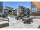 Community space with outdoor kitchen, dining tables, and manicured landscaping at 1244 Chelsea Nw Cir, Atlanta, GA 30318