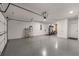 Spacious garage with ample room for parking and storage plus home gym equipment at 1244 Chelsea Nw Cir, Atlanta, GA 30318