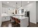 Bright kitchen featuring white cabinets, center island, and stainless steel appliances at 1244 Chelsea Nw Cir, Atlanta, GA 30318