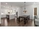 Modern kitchen with white cabinets, center island, and stainless steel appliances at 1244 Chelsea Nw Cir, Atlanta, GA 30318