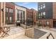 Shared patio area with gravel landscaping and a built-in grill at 1244 Chelsea Nw Cir, Atlanta, GA 30318