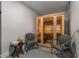 Relaxing sauna room with a wooden sauna and comfortable seating area at 1244 Chelsea Nw Cir, Atlanta, GA 30318