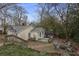 The home has a backyard with a small deck area and a firepit with seating at 257 Vance Ne Cir, Marietta, GA 30060