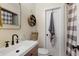 Modern bathroom featuring a sleek vanity, toilet, and a shower with stylish tile and fixtures at 257 Vance Ne Cir, Marietta, GA 30060