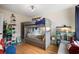 Cozy bedroom featuring a bunk bed, bookshelves and shelves for toys, and a comfortable seating area at 257 Vance Ne Cir, Marietta, GA 30060