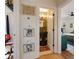 Hallway view leading to a stylish powder room and a comfortable bedroom, showcasing the home's layout at 257 Vance Ne Cir, Marietta, GA 30060