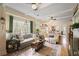 Inviting living room with hardwood floors, beamed ceilings, and stylish decor at 257 Vance Ne Cir, Marietta, GA 30060