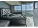 Main bedroom with city views and a large bed at 361 17Th Nw St # 1121, Atlanta, GA 30363