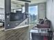 Modern living room with city views and hardwood floors at 361 17Th Nw St # 1121, Atlanta, GA 30363