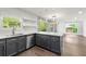 Modern kitchen with an island and white quartz countertops at 3680 Admiral Dr, Chamblee, GA 30341